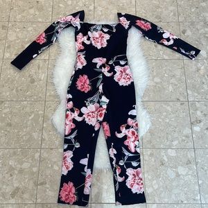 Floral long sleeve jumpsuit very quality fabric size 6 from ASOS